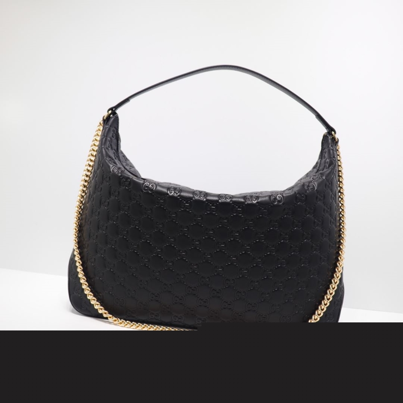 G*u*i top handle bags